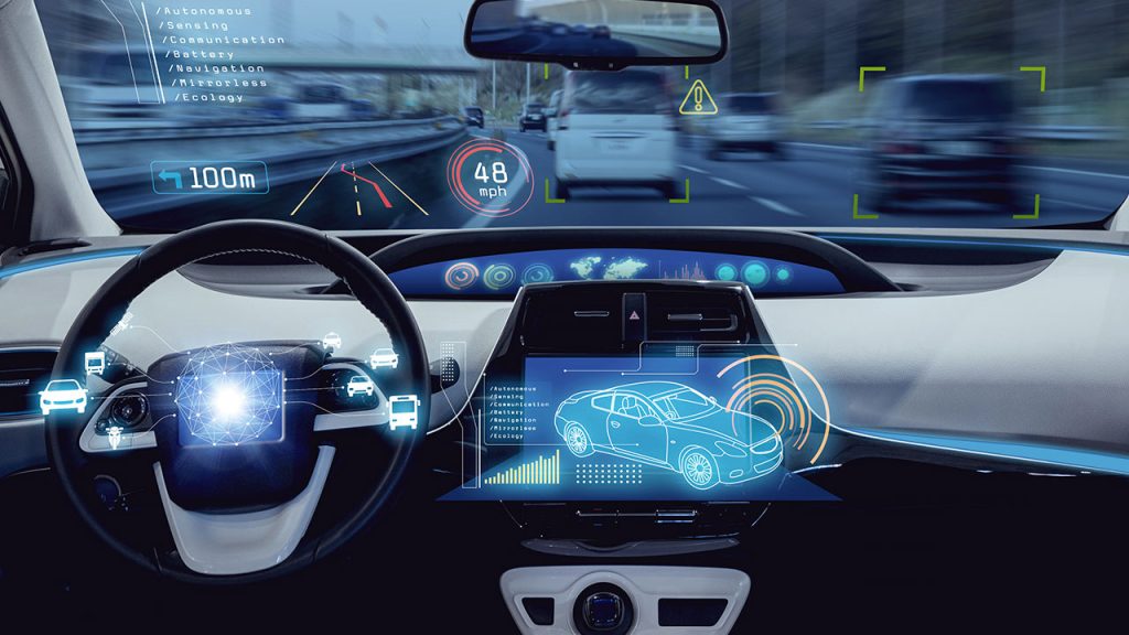 View from inside an autonomous car showing a digital dashboard and augmented reality displays highlighting speed, distance, and nearby vehicles, with a road and traffic visible through the windshield.